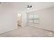 The bedroom includes carpeted floors, a ceiling fan, and an ensuite bathroom at 2039 Morning Gold Dr, Maiden, NC 28650