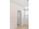 Bright dining room with archway, chandelier, and white wood trim at 2039 Morning Gold Dr, Maiden, NC 28650
