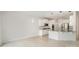 Modern kitchen featuring white cabinets, stainless steel appliances, granite countertops, and modern pendant lights at 2039 Morning Gold Dr, Maiden, NC 28650