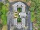 Aerial view of condo complex showing building layout, surrounding greenery, and parking areas at 211 Heritage Blvd # 301, Fort Mill, SC 29715