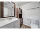 Bathroom with a white vanity, wood-look floors, subway tile in the shower, and updated fixtures at 211 Heritage Blvd # 301, Fort Mill, SC 29715