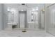 Relaxing bathroom with a large soaking tub, dual sinks, and ample mirror space for a spa-like experience at 3109 Savannah Hills Dr, Matthews, NC 28105