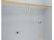 Simple closet with a wooden rack and a blank canvas for personalization at 3109 Savannah Hills Dr, Matthews, NC 28105