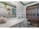 Classic bathroom with a large mirror, ample counter space, and a patterned shower curtain at 3407 14Th Sw Ave, Hickory, NC 28602