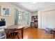 Bright bedroom with hardwood floors, a window view, and closet providing ample storage space at 3407 14Th Sw Ave, Hickory, NC 28602