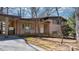 Charming brick home featuring a cozy front porch and a well-maintained landscaped yard at 3407 14Th Sw Ave, Hickory, NC 28602
