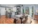 Eat-in kitchen with stainless steel appliances, white cabinets, island, and outdoor access at 3407 14Th Sw Ave, Hickory, NC 28602