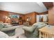 Inviting living room with plush sofas, wood accents, and a view of the stairway at 3407 14Th Sw Ave, Hickory, NC 28602