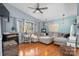 Comfortable living room with large sectional sofa, hardwood flooring, and natural light from the windows at 3407 14Th Sw Ave, Hickory, NC 28602
