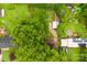 An aerial view of the property showcasing the home and surrounding greenery at 4107 Windwood Dr, Gastonia, NC 28056