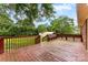 Spacious deck with a built in bench overlooking the backyard at 4107 Windwood Dr, Gastonia, NC 28056