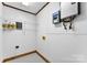 Laundry room with storage shelves and a utility sink hook-up at 4107 Windwood Dr, Gastonia, NC 28056