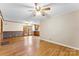 Spacious living room featuring hardwood floors and sliding glass doors at 4107 Windwood Dr, Gastonia, NC 28056