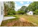 Spacious backyard with a concrete patio and lush green grass at 506 Legrand St, Shelby, NC 28150