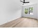 Bright bedroom with large window and modern ceiling fan at 506 Legrand St, Shelby, NC 28150