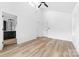 Bedroom featuring vaulted ceilings, a modern fan, and light wood floors at 506 Legrand St, Shelby, NC 28150