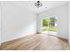 Minimalist bedroom with sliding glass doors leading to the backyard at 506 Legrand St, Shelby, NC 28150