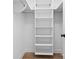 Bright white closet with adjustable shelving and wooden floors at 506 Legrand St, Shelby, NC 28150
