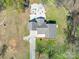 Aerial view of the home, showcasing the backyard, patio, pool and landscaping at 605 Allen Way, Indian Trail, NC 28079