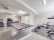 Finished basement rec room with seating, a ping pong table and fitness equipment at 605 Allen Way, Indian Trail, NC 28079