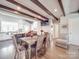 Dining room with modern table, chairs, hardwood floors and access to the kitchen at 605 Allen Way, Indian Trail, NC 28079