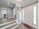 Welcoming foyer with natural light, hardwood floors, and access to multiple rooms, creates an inviting entrance at 605 Allen Way, Indian Trail, NC 28079