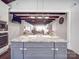 Spacious kitchen with a large center island, white cabinets, and stainless steel appliances at 605 Allen Way, Indian Trail, NC 28079
