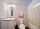 Cozy bathroom featuring a tub and shower combination with a modern white vanity at 185 Crystal Bay Dr, Mooresville, NC 28115