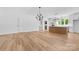 Open kitchen with island, stainless appliances, hanging lights and view to living room at 2363 Reepsville Rd, Lincolnton, NC 28092