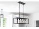 Modern kitchen with a stylish, hanging light fixture above the kitchen island at 2363 Reepsville Rd, Lincolnton, NC 28092