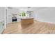 Bright open kitchen with island, stainless appliances and white countertops at 2363 Reepsville Rd, Lincolnton, NC 28092