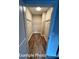 Walk-in closet featuring wood floors and metal shelving at 318 Stanback St, Mount Gilead, NC 27306