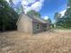 Home with vinyl siding, covered porch, set on a natural lot at 318 Stanback St, Mount Gilead, NC 27306