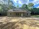Inviting single-story home featuring a covered front porch and simple landscaping at 318 Stanback St, Mount Gilead, NC 27306