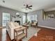 Cozy living room with hardwood floors, fireplace, and stylish decor at 557 S Portman Ln, Fort Mill, SC 29708