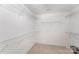 Empty walk-in closet providing ample storage space and metal shelving at 10015 Garrison Watch Ave # 168, Charlotte, NC 28277