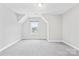 Bright bedroom with plush carpet, neutral walls, one window, and vaulted ceiling at 121 Pine Eagle Dr, Rock Hill, SC 29732