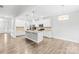 Bright, open kitchen with stainless steel appliances, granite countertops, and hardwood flooring at 121 Pine Eagle Dr, Rock Hill, SC 29732