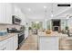 Well-equipped kitchen with stainless steel appliances, granite countertops, and an open view to the living area at 121 Pine Eagle Dr, Rock Hill, SC 29732