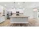 Bright kitchen features a center island, stainless steel appliances, and modern lighting at 121 Pine Eagle Dr, Rock Hill, SC 29732