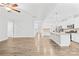 Bright, open living space leading to a modern kitchen with stainless appliances at 121 Pine Eagle Dr, Rock Hill, SC 29732