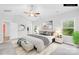 Serene main bedroom with a ceiling fan, lots of natural light, and an ensuite bathroom at 121 Pine Eagle Dr, Rock Hill, SC 29732