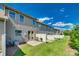 Well-maintained backyard with green lawn, patios, and privacy fencing at 1213 Bhaltair Ln, Fort Mill, SC 29708