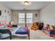 Bright ' room with two windows, a bed, toys, and comfortable carpet at 1213 Bhaltair Ln, Fort Mill, SC 29708