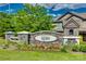 Stone community sign for Ayrshire featuring a manicured flower bed at 1213 Bhaltair Ln, Fort Mill, SC 29708