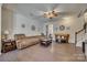 Comfortable living room with hardwood floors, ceiling fan and ample seating at 1213 Bhaltair Ln, Fort Mill, SC 29708