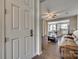 Inviting living room view from the doorway showcasing wood floors, fan, and open-concept layout at 1213 Bhaltair Ln, Fort Mill, SC 29708