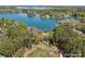 Beautiful aerial shot of lakefront property highlighting the private waterfront and mature tree coverage at 126 Balmoral Dr, Mooresville, NC 28117