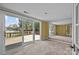 Bedroom with a large sliding glass doors to the deck and mirrored wall at 126 Balmoral Dr, Mooresville, NC 28117
