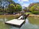 Private dock with covered area, and a sun platform providing direct access to the pristine lake waters at 126 Balmoral Dr, Mooresville, NC 28117